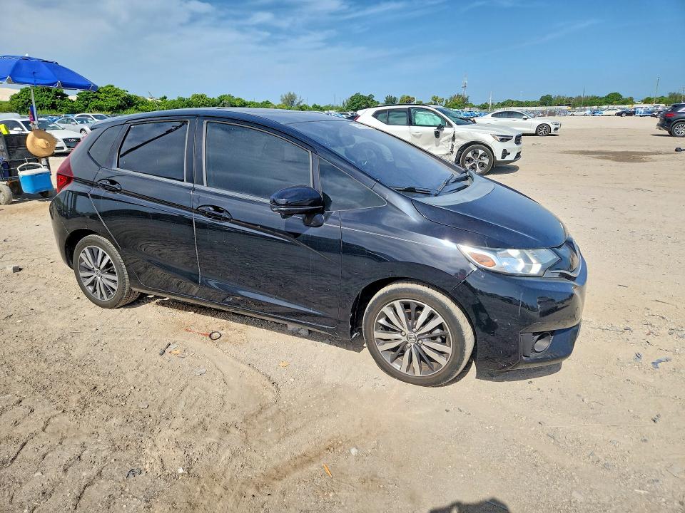 2015 Honda Fit VIN 3HGGK5H87FM757954 COPART salvage auction — WATER/FLOOD, FL - CERT OF TITLE-FLOOD & REBUILT, sold $3,050 on 2026-07-28 (photo 4)