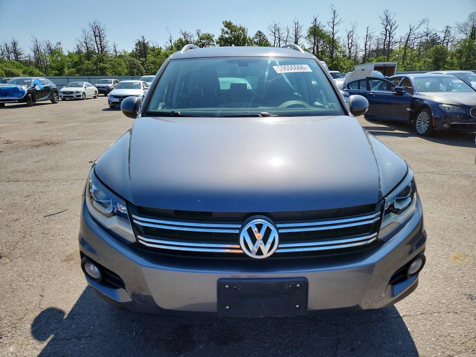 2016 Volkswagen Tiguan VIN WVGBV7AX0GW507501 COPART salvage auction — MINOR DENT/SCRATCHES, Ny - Certificate Of Title, sold $3,200 on 2026-07-15 (photo 5)