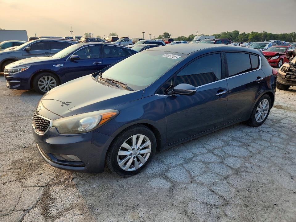 2015 Kia Forte VIN KNAFX5A83F5295031 COPART salvage auction — NORMAL WEAR, In - Certificate Of Title, sold $500 on 2026-07-31 (photo 1)