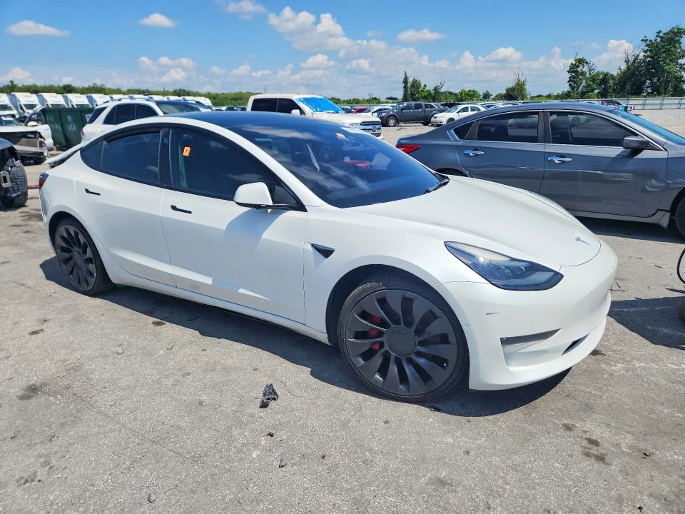 2021 Tesla Model 3 VIN 5YJ3E1ECXMF088456 COPART salvage auction — REAR END, Fl - Certificate Of Title, sold $5,100 on 2026-07-28 (photo 4)