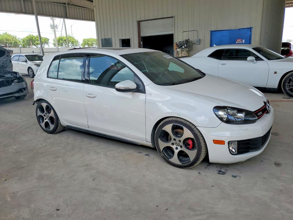 2011 Volkswagen Gti VIN WVWGV7AJ9BW050136 COPART salvage auction — REAR END, FL - CERT OF TITLE SLVG REBUILDABLE, sold $2,100 on 2026-07-22 (photo 4)