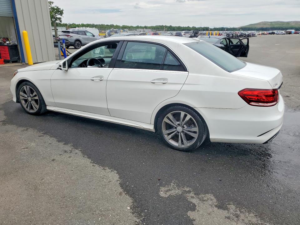 2014 Mercedes-benz E-klasse VIN WDDHF5KBXEA977554 COPART salvage auction — NORMAL WEAR, Wv - Certificate Of Title, sold $100 on 2026-07-28 (photo 2)