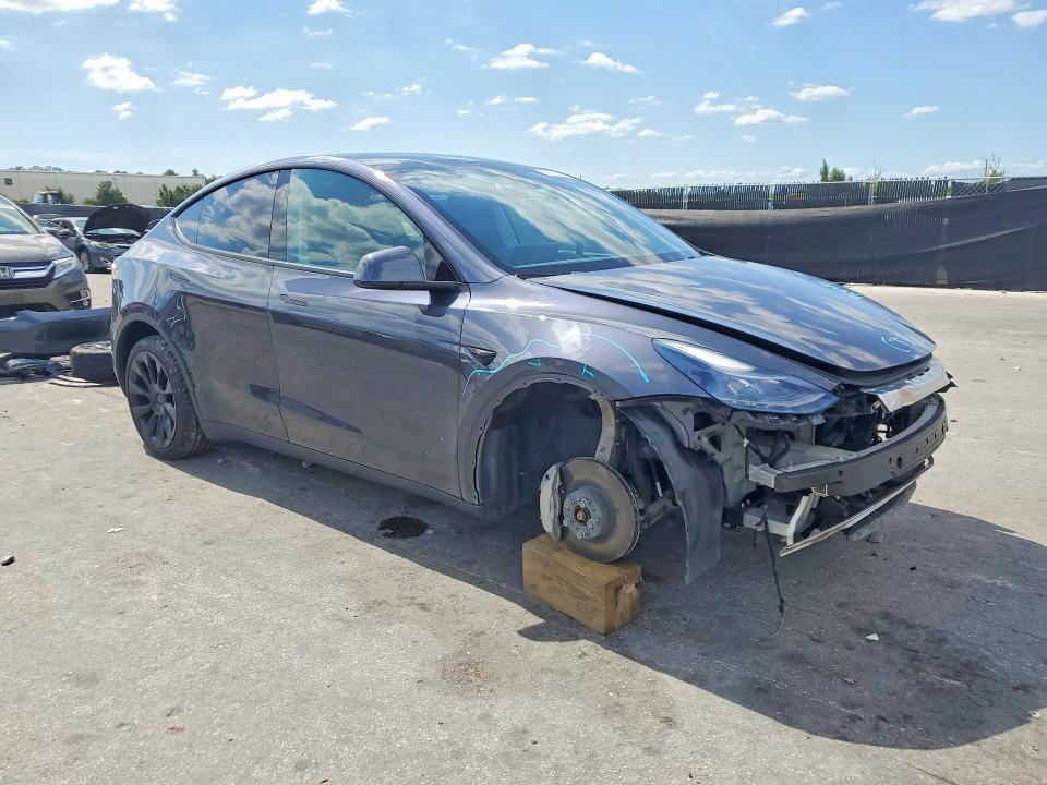 2023 Tesla Model y VIN 7SAYGDEE8PF859104 COPART salvage auction — FRONT END, Fl - Cert Of Title Slvg Rebuildable, sold $6,700 on 2026-07-30 (photo 4)