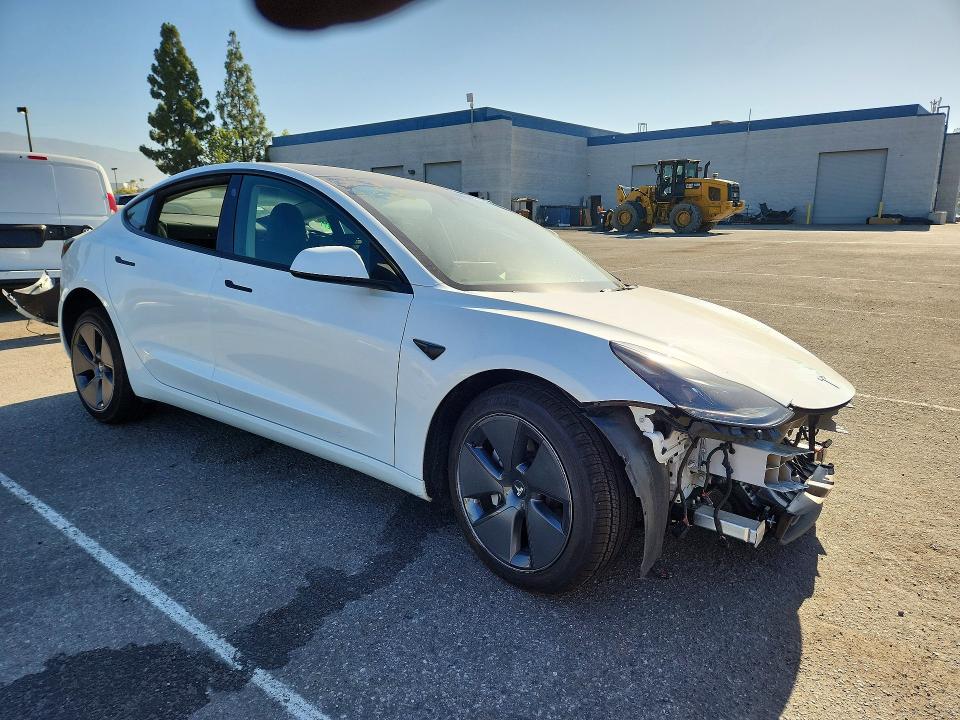 2023 Tesla Model 3 VIN 5YJ3E1EA3PF555543 COPART salvage auction — FRONT END, Ca - Salvage Certificate, sold $6,200 on 2026-07-16 (photo 4)