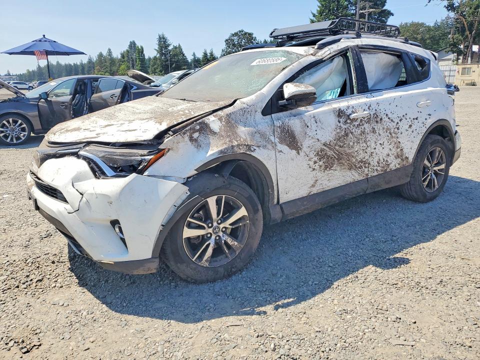 2017 Toyota Rav 4 VIN JTMRFREV8HJ118334 COPART salvage auction — ROLLOVER, Wa - Bill Of Sale, sold $1,950 on 2026-07-17 (photo 1)