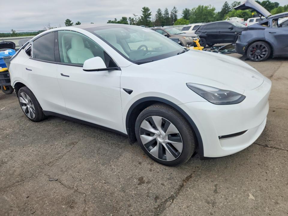 2023 Tesla Model y VIN 7SAYGDEE4PF796230 COPART salvage auction — REAR END, PA - CERTIFICATE OF SALVAGE, sold $8,600 on 2026-07-28 (photo 4)