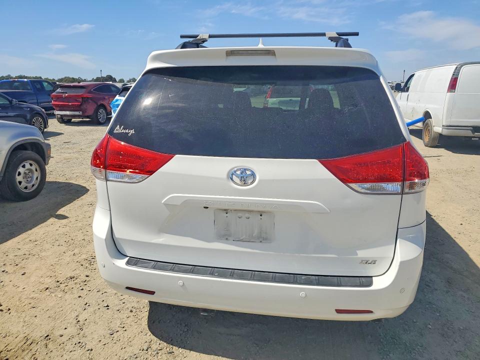 2011 Toyota Sienna VIN 5TDYK3DC6BS012799 COPART salvage auction — SIDE, CA - SALVAGE CERTIFICATE, sold $1,150 on 2026-07-09 (photo 6)