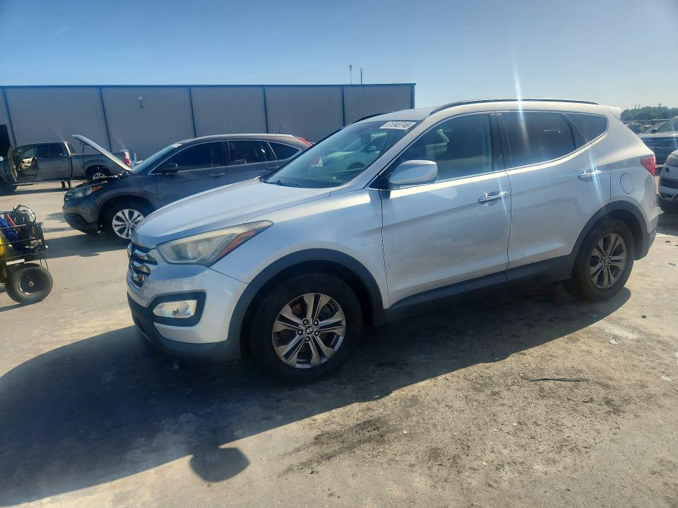 2014 Hyundai Santa fe VIN 5XYZU3LB8EG189301 COPART salvage auction — MECHANICAL, FL - CERTIFICATE OF TITLE, sold $1,800 on 2026-07-20 (photo 1)