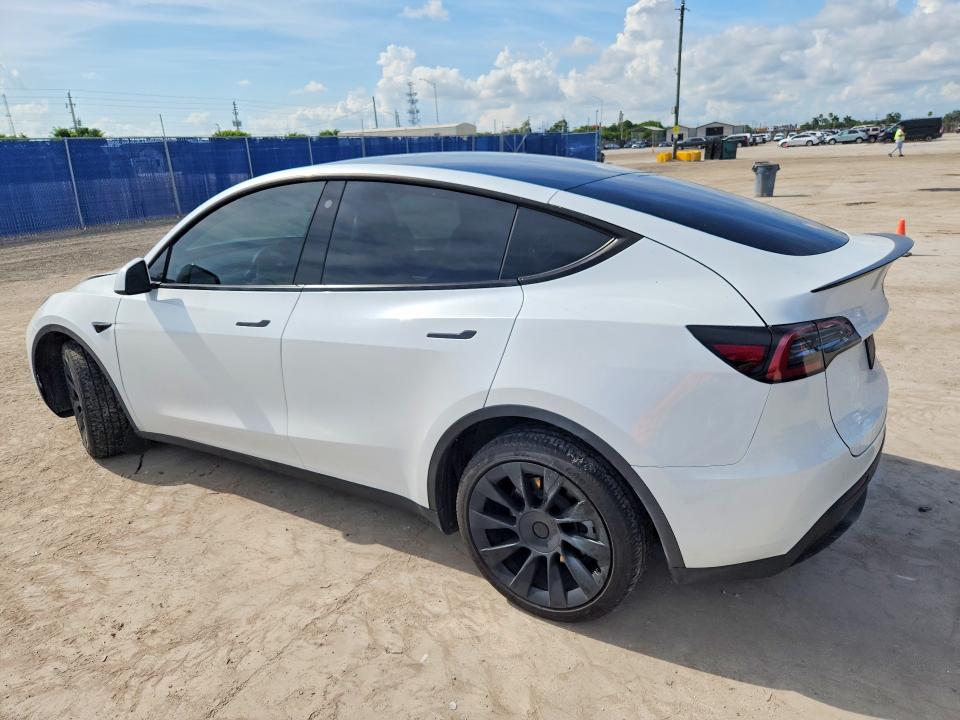 2023 Tesla Model y VIN 7SAYGDEE5PA092096 COPART salvage auction — FRONT END, Fl - Cert Of Title Slvg Rebuildable, sold $13,600 on 2026-07-15 (photo 2)