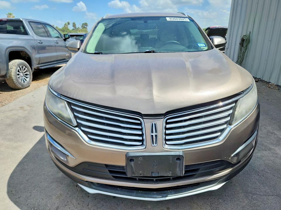 2018 Lincoln Mkc VIN 5LMCJ1C92JUL01706 COPART salvage auction — MINOR DENT/SCRATCHES, Tx - Cert Of Title-Rebuilt Salvage, sold $1,650 on 2026-07-08 (photo 5)