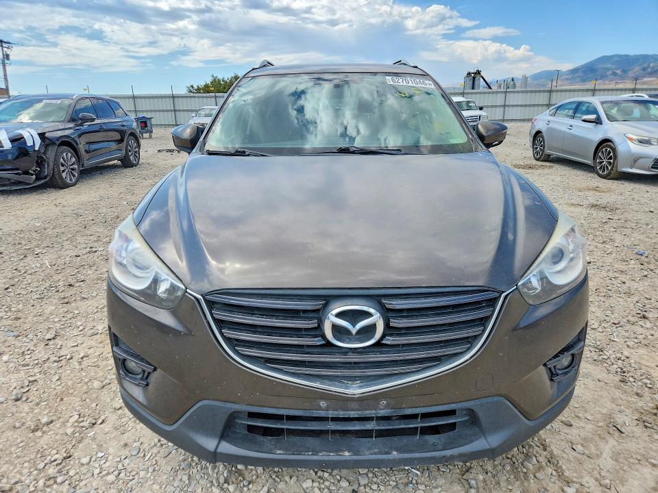 2016 Mazda Cx-5 VIN JM3KE4CY7G0887505 COPART salvage auction — MINOR DENT/SCRATCHES, UT - CERTIFICATE OF TITLE, sold $225 on 2026-07-28 (photo 5)