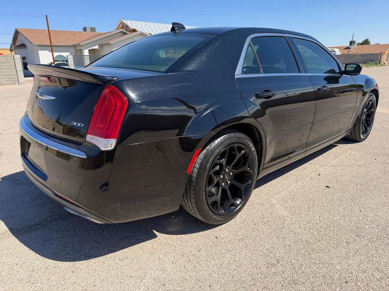 2015 Chrysler 300 VIN 2C3CCAAG0FH785943 COPART salvage auction — DAMAGE HISTORY, TX - CERT OF TITLE-REBUILT SALVAGE (P), sold $6,200 on 2026-08-19 (photo 4)
