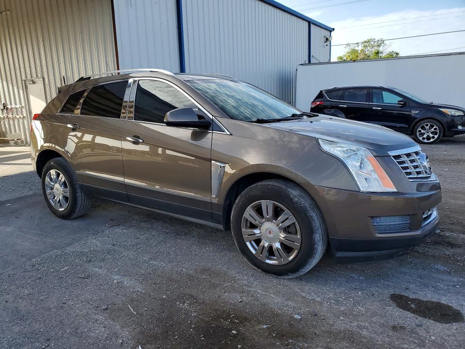 2014 Cadillac Srx VIN 3GYFNBE37ES647676 COPART salvage auction — SIDE, Fl - Cert Of Title Slvg Rebuildable, sold $2,150 on 2026-07-31 (photo 4)