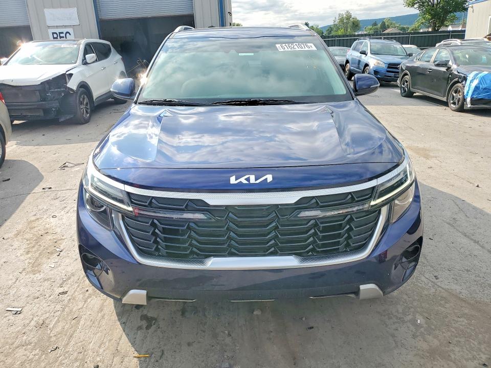 2024 Kia Seltos VIN KNDERCAA0R7557175 COPART salvage auction — MINOR DENT/SCRATCHES, Fl - Certificate Of Title, sold $18,900 on 2026-08-12 (photo 5)