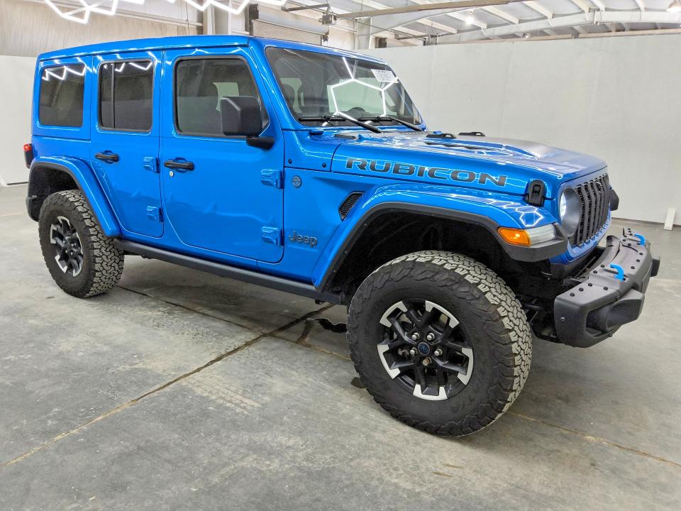 2024 Jeep Wrangler / VIN 1C4RJXR6XRW186788 COPART salvage auction — NORMAL WEAR, Mo - Certificate Of Title, sold $15,600 on 2026-07-30 (photo 4)