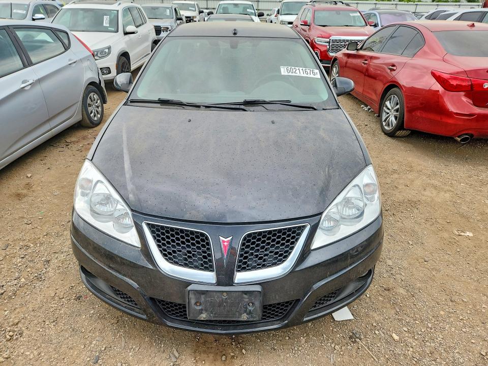 2009 Pontiac G6 VIN 1G2ZJ57K194254772 COPART salvage auction — WATER/FLOOD, Wv - Salvage Cert - Flood Damaged, sold $300 on 2026-08-20 (photo 5)