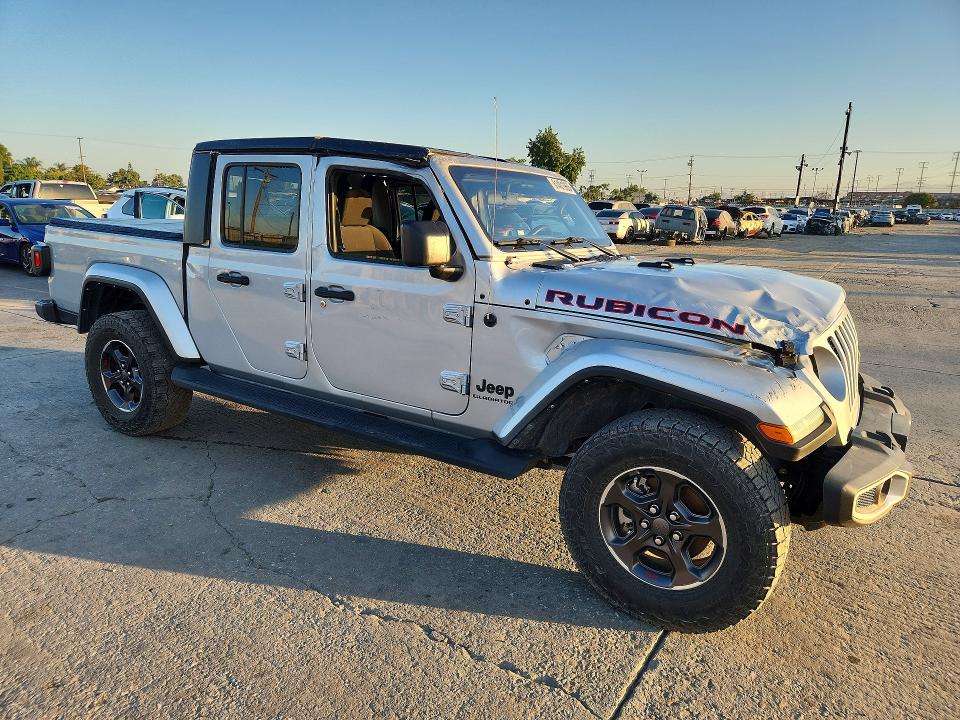 2022 Jeep Gladiator VIN 1C6HJTAGXNL138672 COPART salvage auction — FRONT END, TX - DIS/DLR/EXP ONLY SALVAGE TITLE (P), sold $13,900 on 2026-07-29 (photo 4)