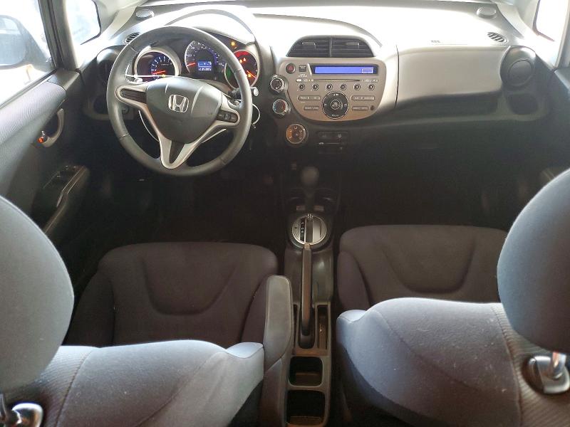 2009 Honda Fit VIN JHMGE88419S018741 COPART salvage auction — MINOR DENT/SCRATCHES, Ca - Dis/Dlr/Exp Only Clean Title, sold $825 on 2026-07-30 (photo 8)