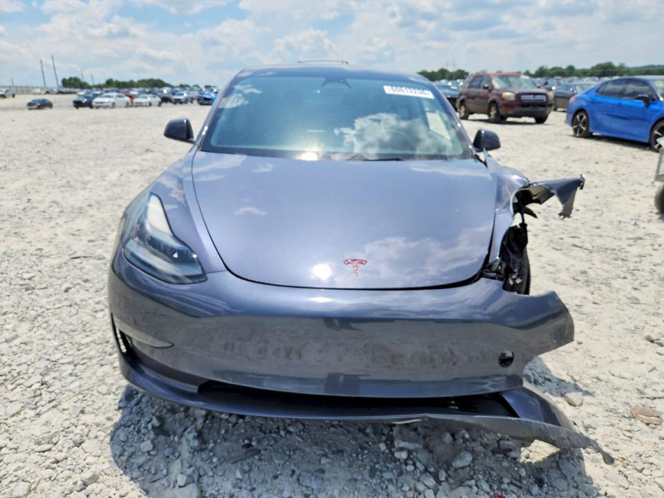 2023 Tesla Model 3 VIN 5YJ3E1EA4PF421995 COPART salvage auction — FRONT END, Fl - Certificate Of Title, sold $7,300 on 2026-07-20 (photo 5)