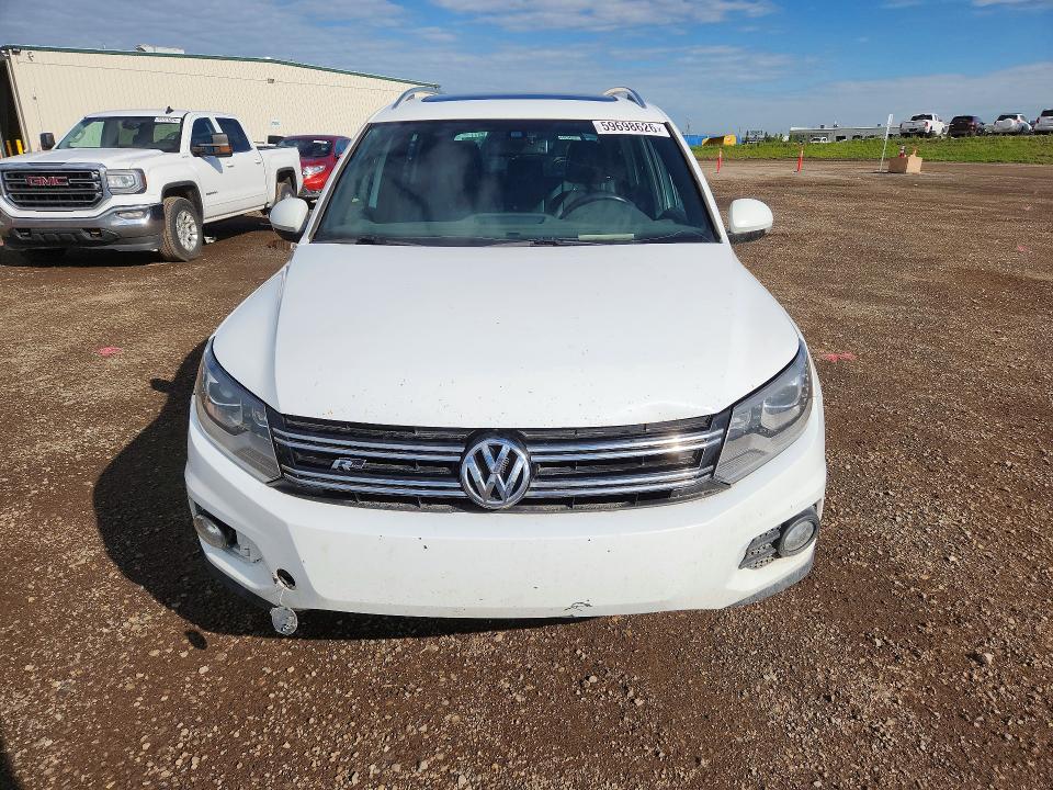 2016 Volkswagen Tiguan VIN WVGJV7AX1GW500794 COPART salvage auction — MECHANICAL, Ab - Bos - Rebuilt, sold $975 on 2026-07-28 (photo 5)