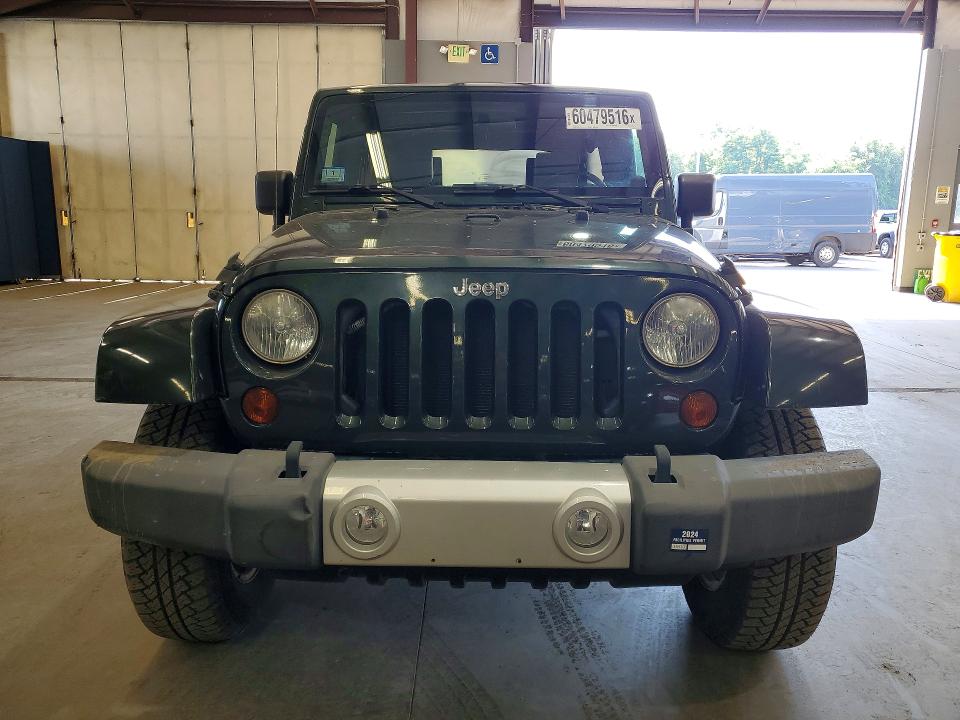 2010 Jeep Wrangler unlimited VIN 1J4BA5H17AL167899 COPART salvage auction — MINOR DENT/SCRATCHES, Ma - Certificate Of Title (P), sold $7,000 on 2026-07-27 (photo 5)