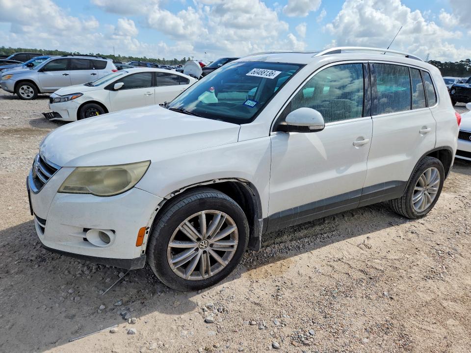 2009 Volkswagen Tiguan VIN WVGBV75N39W521811 COPART salvage auction — NORMAL WEAR, TX - CERT OF TITLE-REBUILT SALVAGE, sold $825 on 2026-07-14 (photo 1)