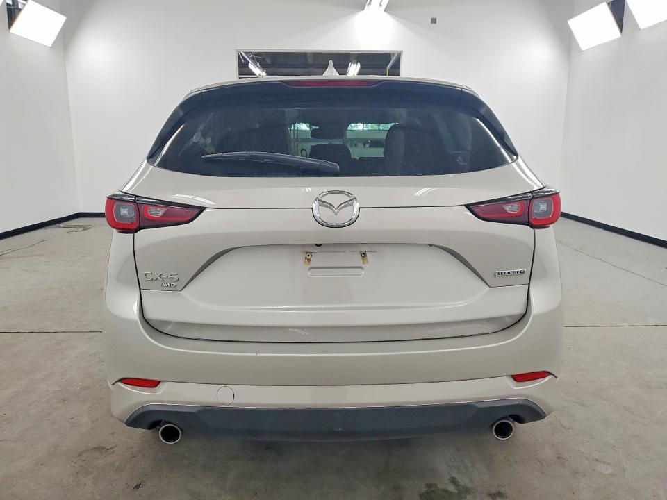 2025 Mazda Cx-5 VIN JM3KFBCL1S0677903 COPART salvage auction — MINOR DENT/SCRATCHES, MI - CERTIFICATE OF TITLE (P), sold $18,000 on 2026-07-15 (photo 6)