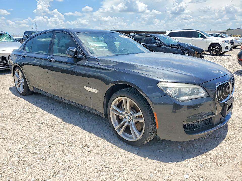 2015 BMW 7er VIN WBAYE8C51FD780907 COPART salvage auction — WATER/FLOOD, Tx - Salvage Title-Flood Damage, sold $2,050 on 2026-07-21 (photo 4)