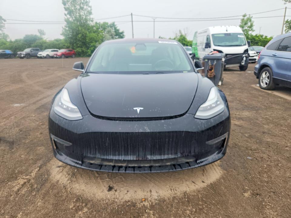 2018 Tesla Model 3 VIN 5YJ3E1EA7JF095617 COPART salvage auction — MINOR DENT/SCRATCHES, Qc - Aucune Mention, sold $9,300 on 2026-07-29 (photo 5)
