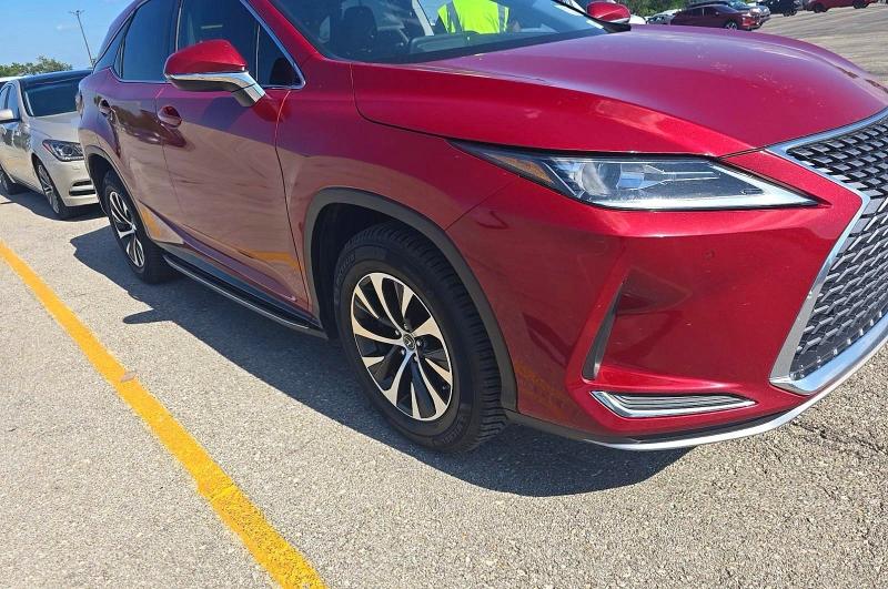 2020 Lexus Rx 350 VIN 2T2AZMDA7LC212209 COPART salvage auction — NORMAL WEAR, MO - CERTIFICATE OF TITLE (P), sold $15,700 on 2026-07-23 (photo 2)