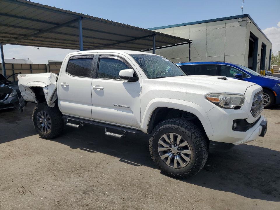 2016 Toyota Tacoma VIN 5TFAZ5CN6GX008927 COPART salvage auction — REAR END, TX - SALVAGE VEHICLE TITLE, sold $10,300 on 2026-07-24 (photo 4)