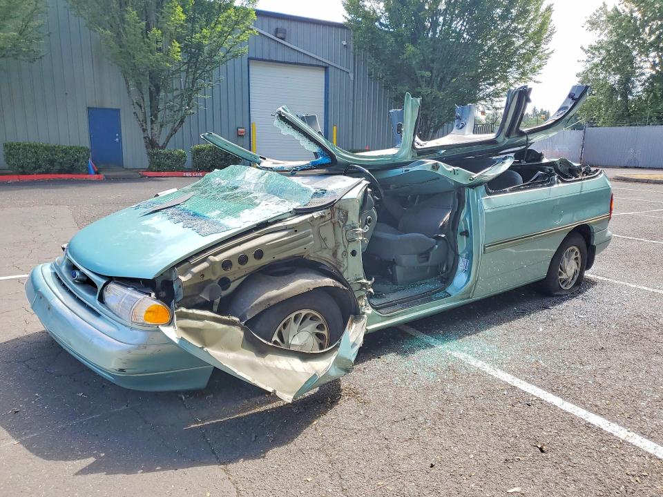 1995 Ford Windstar VIN 2FMDA5145SBC44236 — COPART salvage auction photo