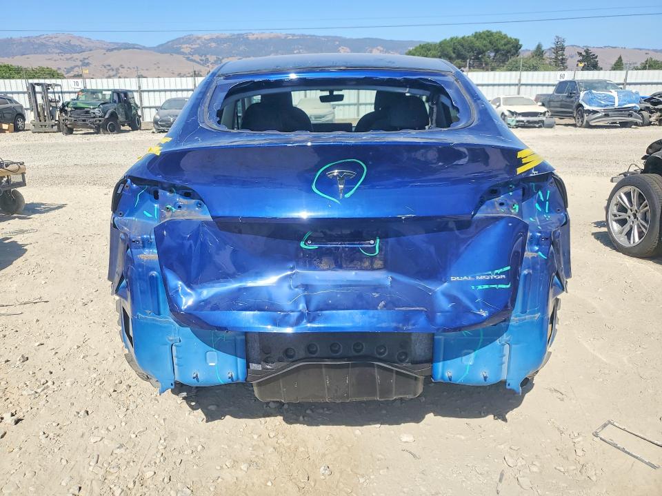 2023 Tesla Model y VIN 7SAYGDEEXPF742110 COPART salvage auction — REAR END, Ca - Salvage Certificate, sold $8,900 on 2026-07-16 (photo 6)