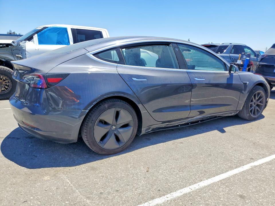 2018 Tesla Model 3 VIN 5YJ3E1EAXJF059176 COPART salvage auction — MINOR DENT/SCRATCHES, Ca - Salvage Certificate, sold $5,800 on 2026-07-16 (photo 3)
