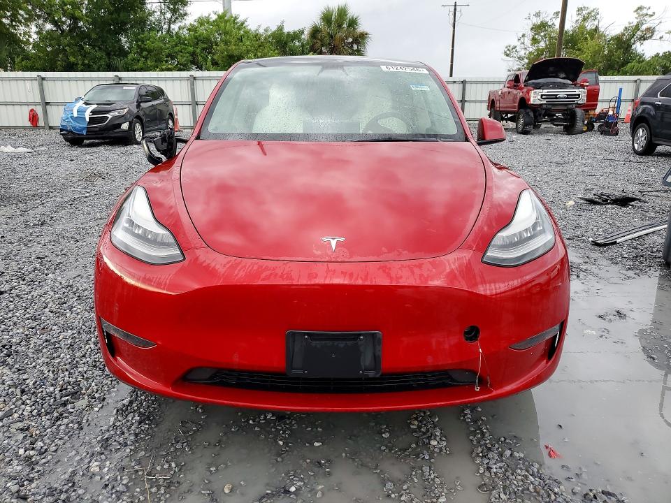 2021 Tesla Model y VIN 5YJYGDEDXMF110532 COPART salvage auction — SIDE, Tn - Certificate Of Title, sold $11,700 on 2026-07-31 (photo 5)