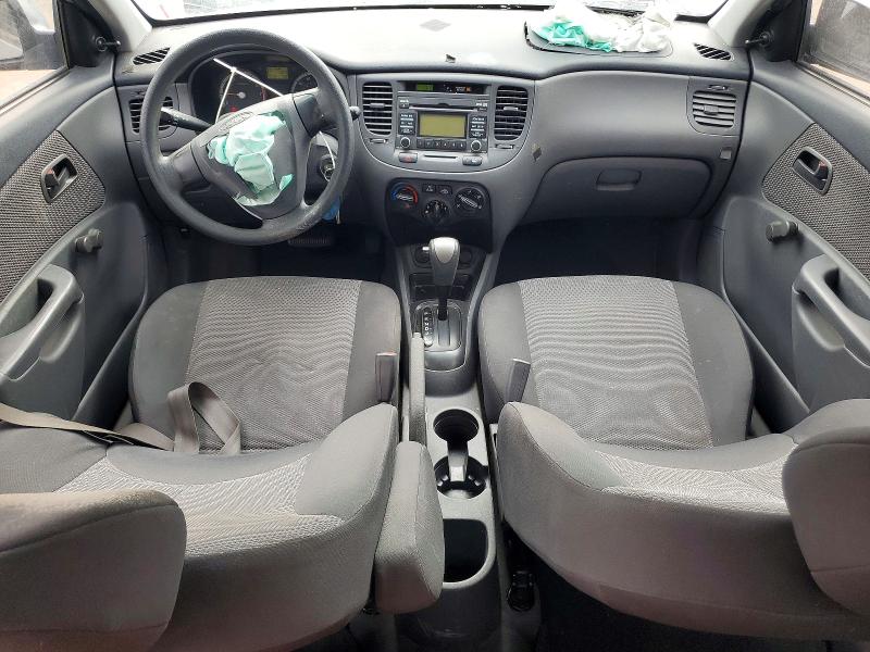 2009 Kia Rio VIN KNADE223X96451207 COPART salvage auction — FRONT END, TX - SALVAGE VEHICLE TITLE (P), sold $125 on 2026-07-31 (photo 8)