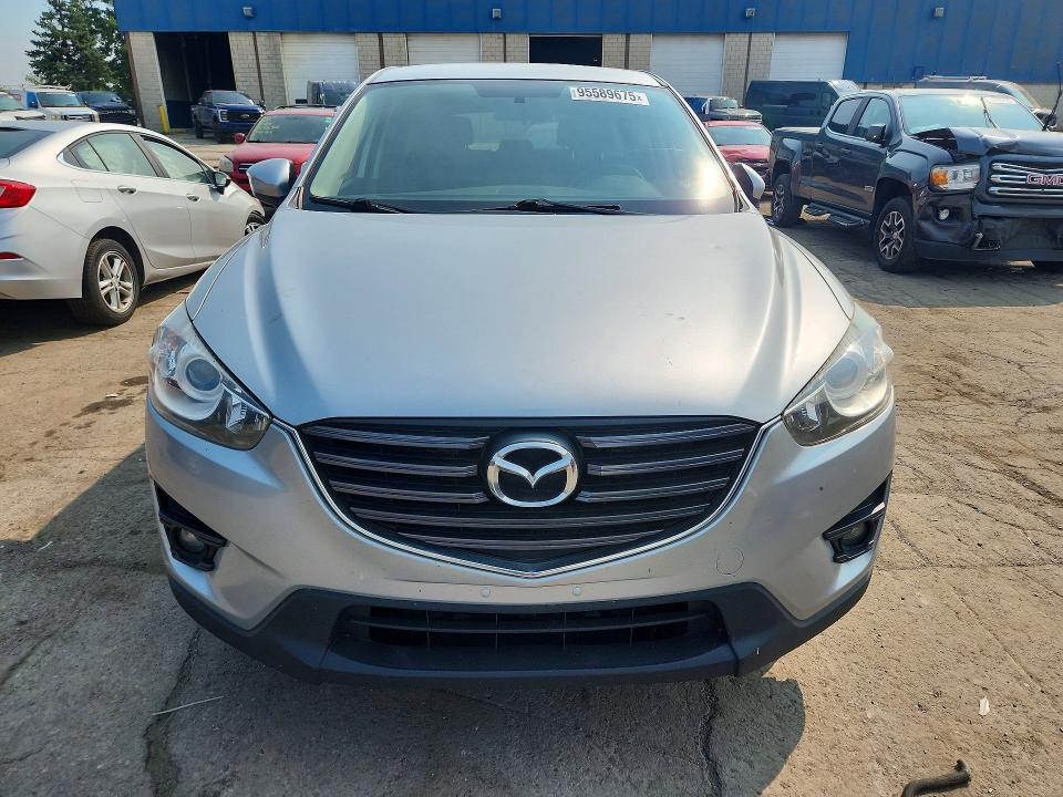 2016 Mazda Cx-5 VIN JM3KE4CY3G0677385 COPART salvage auction — FRONT END, MI - CERTIFICATE OF TITLE, sold $550 on 2026-07-21 (photo 5)