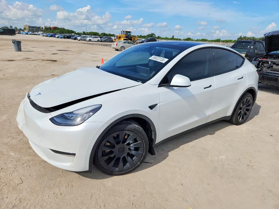 2023 Tesla Model y VIN 7SAYGDEE5PA092096 COPART salvage auction — FRONT END, Fl - Cert Of Title Slvg Rebuildable, sold $13,600 on 2026-07-15 (photo 1)