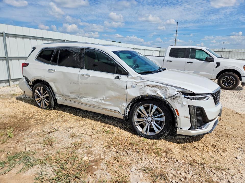 2024 Cadillac Xt6 VIN 1GYKPCRS7RZ719288 COPART salvage auction — SIDE, Tx - Salvage Vehicle Title, sold $2,550 on 2026-07-09 (photo 4)