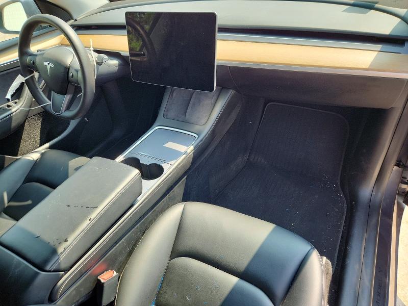 2023 Tesla Model y VIN 7SAYGDEF5PA049323 COPART salvage auction — NORMAL WEAR, MO - CERTIFICATE OF TITLE, sold $9,000 on 2026-07-28 (photo 8)