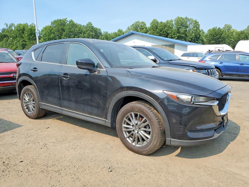 2018 Mazda Cx-5 VIN JM3KFBBM5J1328519 COPART salvage auction — MINOR DENT/SCRATCHES, NY - CERTIFICATE OF TITLE, sold $7,900 on 2026-07-31 (photo 4)