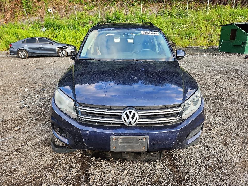 2016 Volkswagen Tiguan VIN WVGAV7AX9GW610895 COPART salvage auction — SIDE, Ny - Mv-907A Salvage Certificate, sold $475 on 2026-08-04 (photo 5)