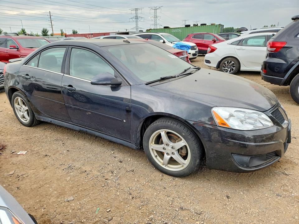 2009 Pontiac G6 VIN 1G2ZJ57K194254772 COPART salvage auction — WATER/FLOOD, Wv - Salvage Cert - Flood Damaged, sold $300 on 2026-08-20 (photo 4)