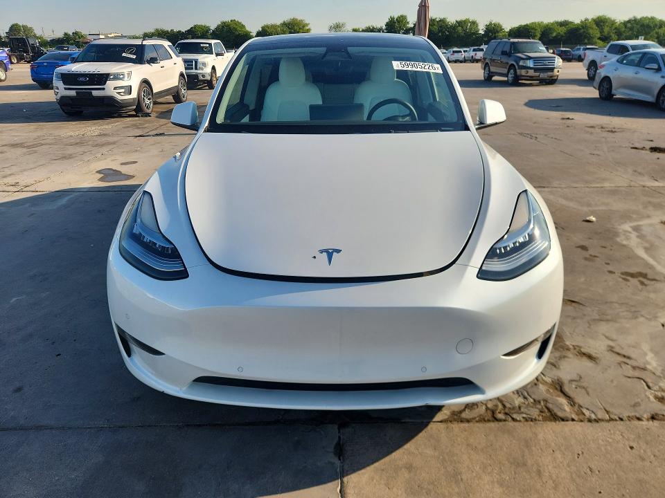2022 Tesla Model y VIN 7SAYGDEE2NF419618 COPART salvage auction — WATER/FLOOD, Tx - Cert Of Title-Reblt Slvg Flood (P), sold $6,900 on 2026-07-16 (photo 5)