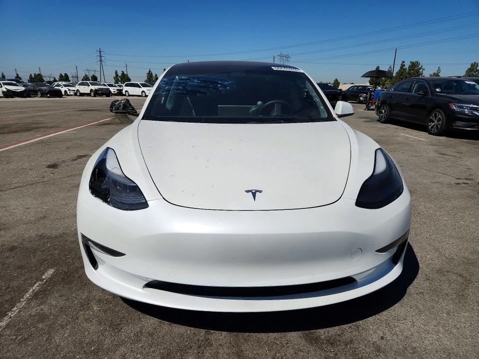 2023 Tesla Model 3 VIN 5YJ3E1EA4PF606046 COPART salvage auction — SIDE, Ca - Salvage Certificate, sold $250 on 2026-07-21 (photo 5)