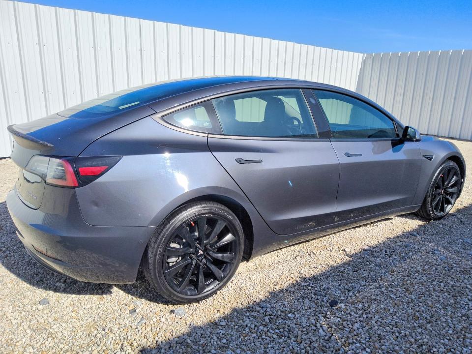 2018 Tesla Model 3 VIN 5YJ3E1EB7JF185035 COPART salvage auction — NORMAL WEAR, Fl - Certificate Of Title, sold $10,900 on 2026-07-28 (photo 3)