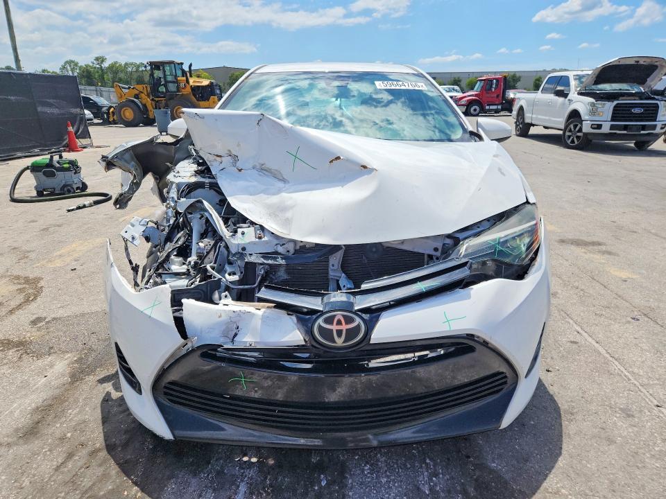 2017 Toyota Corolla VIN 5YFBURHE4HP733851 COPART salvage auction — FRONT END, FL - CERT OF TITLE SLVG REBUILDABLE, sold $1,050 on 2026-07-21 (photo 5)
