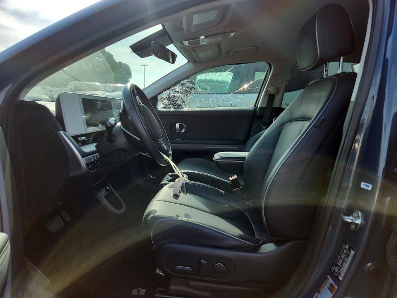 2023 Hyundai Ioniq 5 VIN KM8KNDAF2PU141431 COPART salvage auction — ALL OVER, CT - CERT OF TITLE-SALVAGE, sold $5,000 on 2026-07-23 (photo 7)