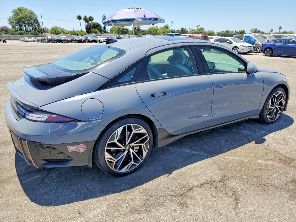 2023 Hyundai Ioniq 6 VIN KMHM54AA8PA045768 COPART salvage auction — DAMAGE HISTORY, CA - CERT OF TITLE-SALVAGED, sold $13,700 on 2026-07-31 (photo 3)
