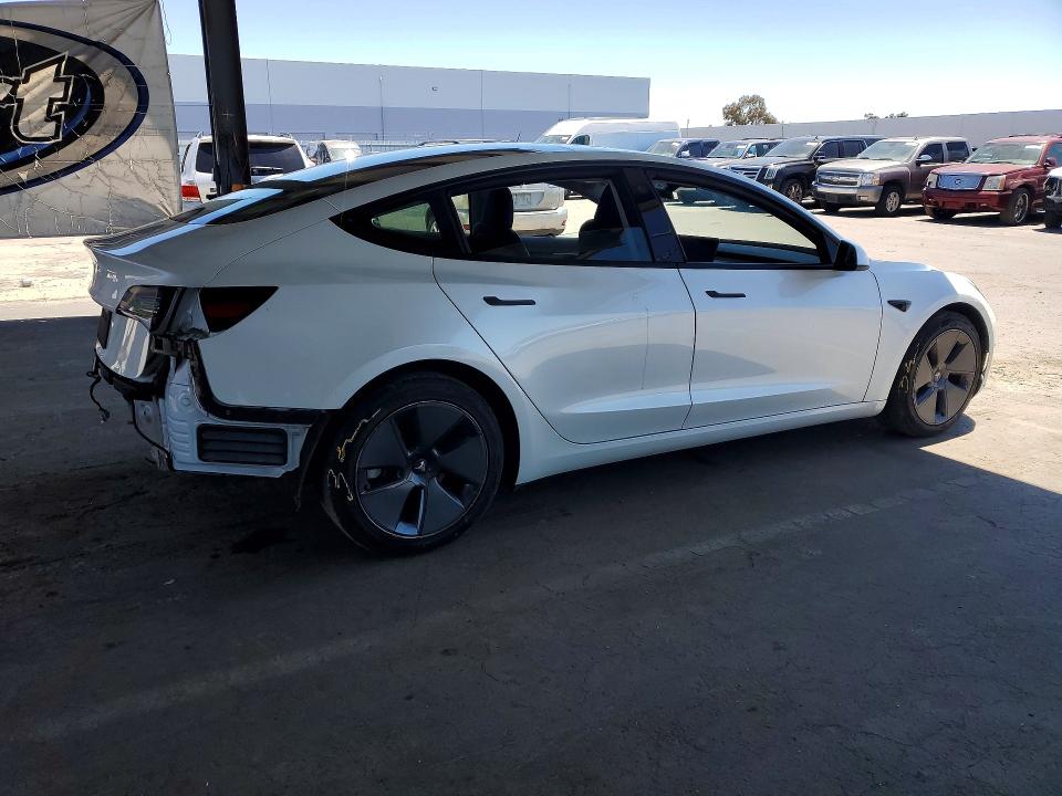 2023 Tesla Model 3 VIN 5YJ3E1EA7PF541256 COPART salvage auction — REAR END, CA - CERTIFICATE OF TITLE (P), sold $14,600 on 2026-07-13 (photo 3)